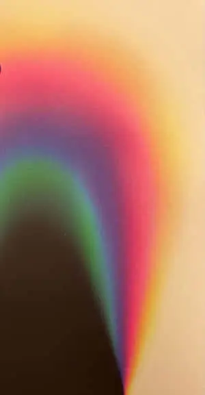 a rainbow colored cd cover with a rainbow in the middle