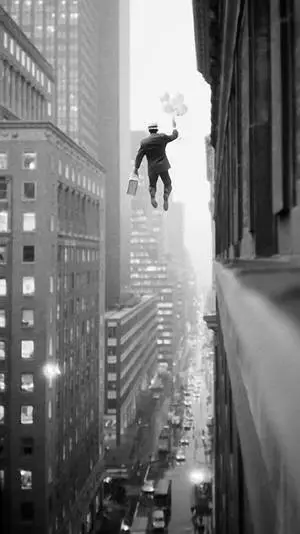 Black And White iPhone Man Floating