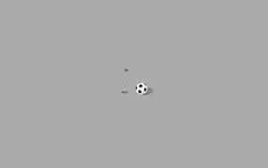 Golf Hole And Soccer Ball Grey Background