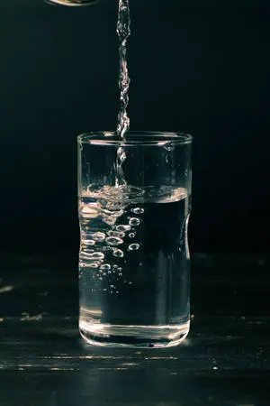 Pouring Liquid Into Glass