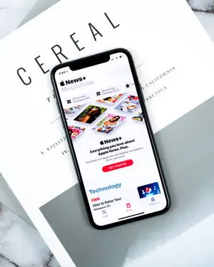 Sleek iPhone Xs with Abstract Background