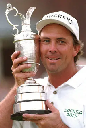 "Young Tom Lehman Celebrating Triumph with Trophy"